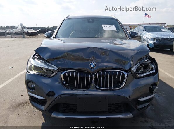 WBXHT3Z36H4A65695 2017 BMW X1 Gray Vista del cuadro de instrumentos