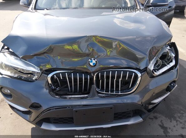 WBXHT3Z36H4A65695 2017 BMW X1 Gray Vista frontal