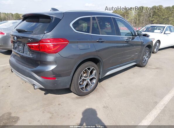 WBXHT3Z36H4A65695 2017 BMW X1 Gray Trasero derecho