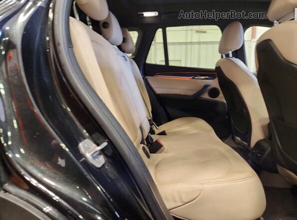 WBXHT3Z38G4A51067 2016 BMW X1 Black უკანა სავარძლების ხედი