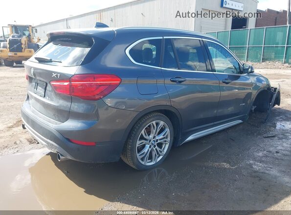 WBXHT3Z39H4A54335 2017 BMW X1 Gray Tył prawy