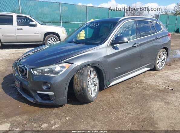 WBXHT3Z39H4A54335 2017 BMW X1 Gray Przód lewy