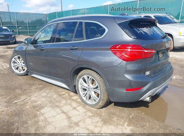WBXHT3Z39H4A54335 2017 BMW X1 Gray Tył lewy