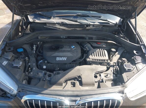 WBXHT3Z39H4A54335 2017 BMW X1 Gray Widok z tyłu