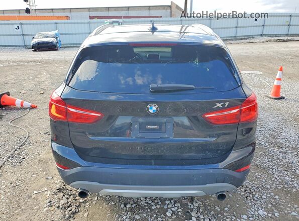 WBXHT3Z39J4A65924 2018 BMW X1 Black Vista trasera