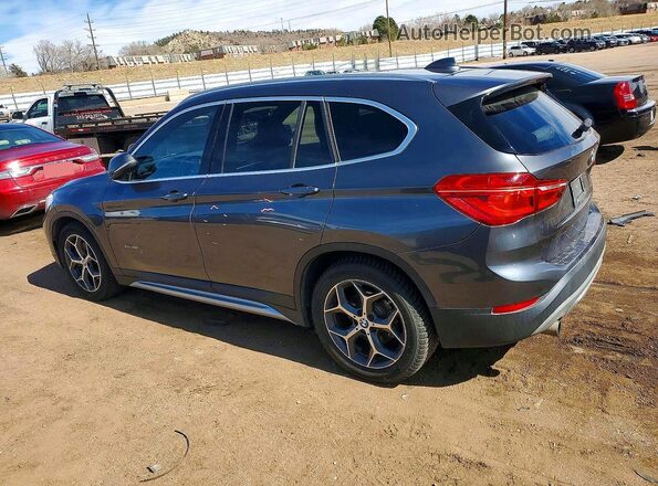 WBXHT3Z3XG4A49112 2016 BMW X1 Charcoal Trasero izquierdo