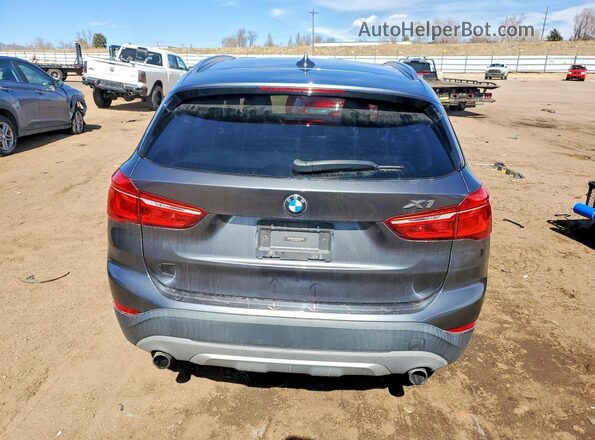 WBXHT3Z3XG4A49112 2016 BMW X1 Charcoal Vista trasera