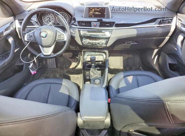 WBXHT3Z3XG4A49112 2016 BMW X1 Charcoal Vista del salpicadero