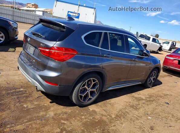 WBXHT3Z3XG4A49112 2016 BMW X1 Charcoal Trasero derecho
