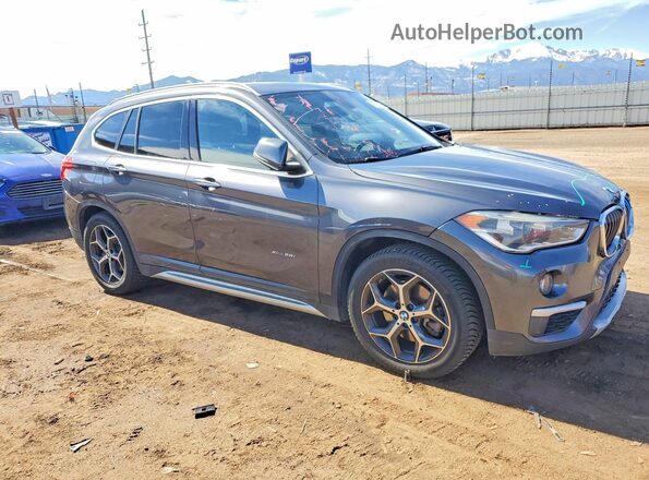 WBXHT3Z3XG4A49112 2016 BMW X1 Charcoal Delantero derecho
