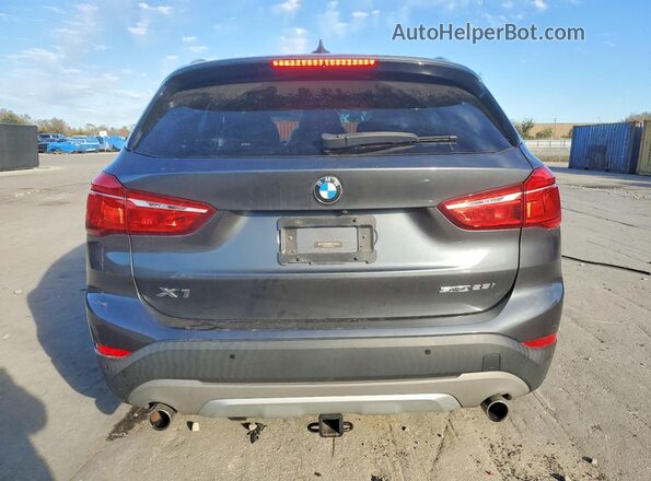 WBXHU7C58K3H44671 2019 BMW X1 Gray Вид ззаду