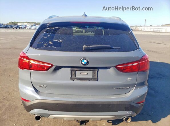 WBXJG7C06M5S28259 2021 BMW X1 Gray უკანა ხედი