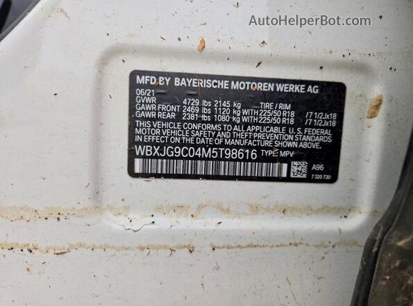 WBXJG9C04M5T98616 2021 BMW X1 White VIN კოდის სტიკერის ხედი