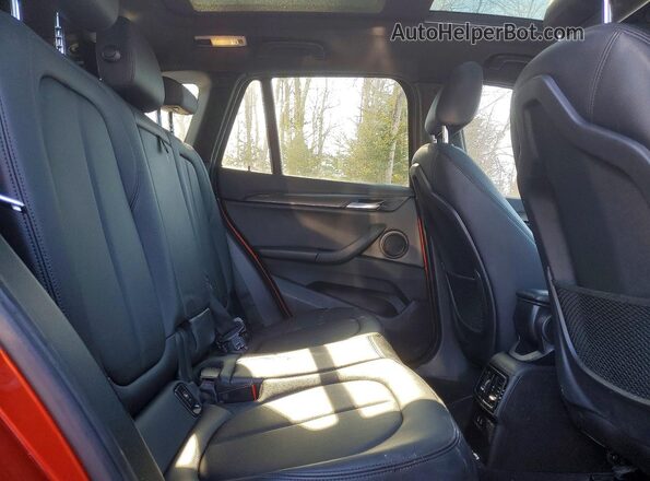 WBXJG9C05L5R28784 2020 BMW X1 Orange Rear interior view