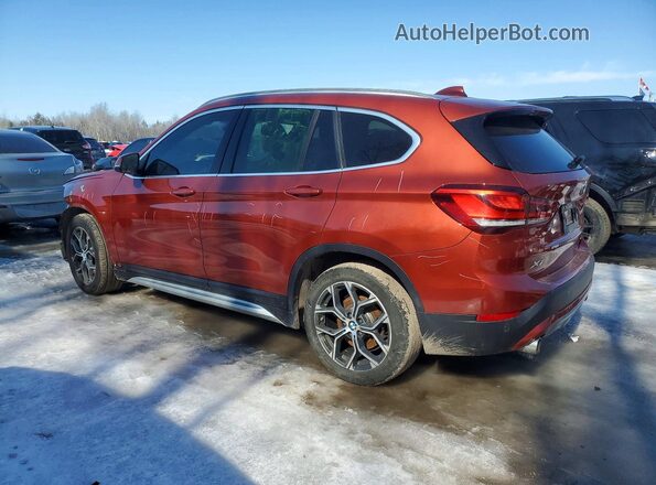 WBXJG9C05L5R28784 2020 BMW X1 Orange Rear left