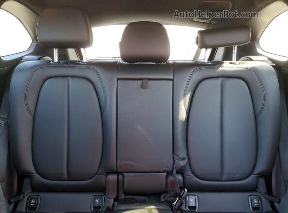 WBXJG9C05L5R28784 2020 BMW X1 Orange Rear seats view