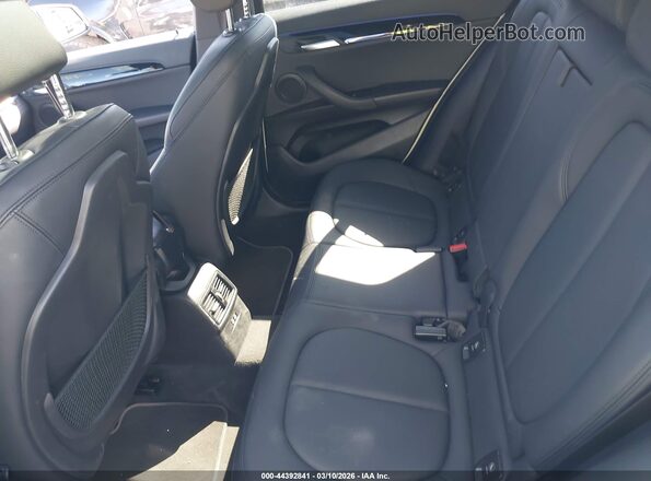 WBXYJ1C06M5S12138 2021 BMW X2 White VIN sticker view