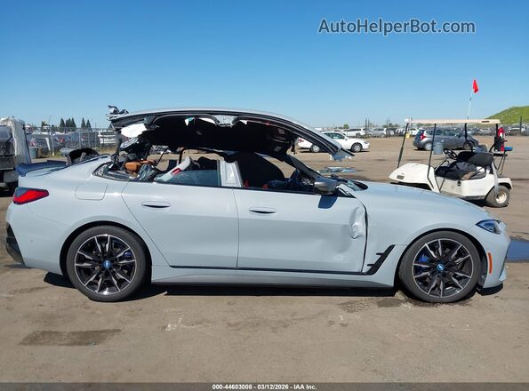 WBY33AW02RFS44467 2024 BMW I4 Blue Սալոնի հետևի տեսք