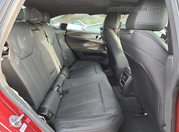 WBY43HD05SFU11197 2025 BMW I4 Red Rear seats view