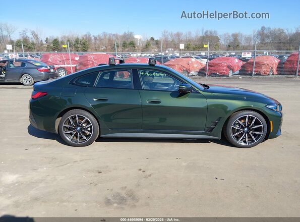 WBY73AW00NFN17434 2022 BMW I4 Green Սալոնի հետևի տեսք