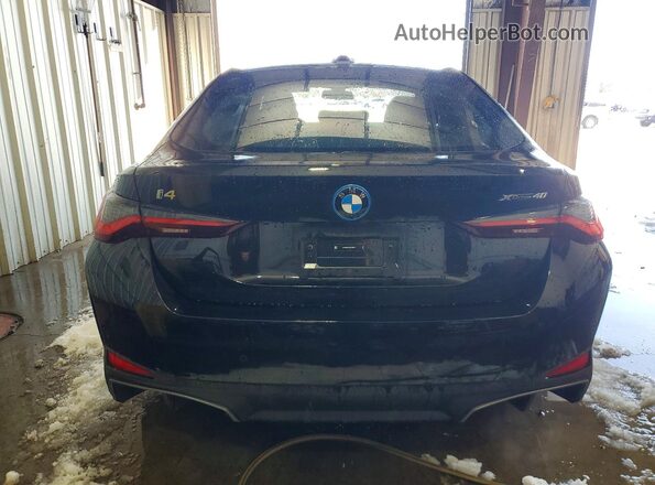 WBY83FB07RFS39435 2024 BMW I4 Black Vista trasera