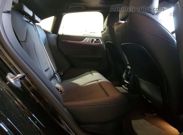 WBY83FB07RFS39435 2024 BMW I4 Black Vista de los asientos traseros