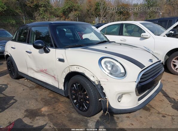 WMWXU1C57J2F79560 2018 MINI HARDTOP Cream Vista interior trasera
