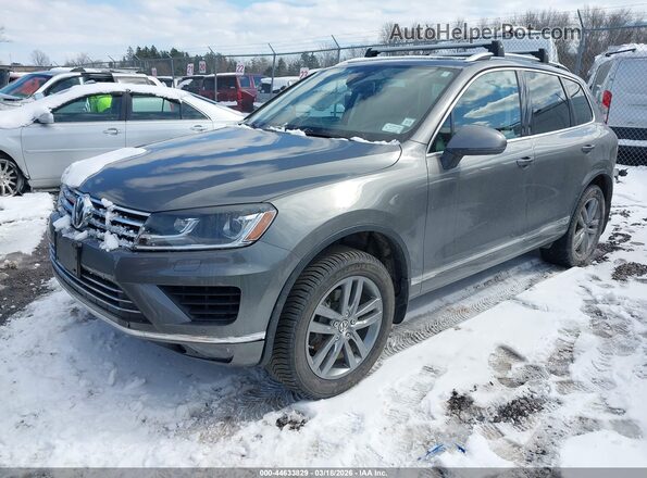 WVGEF9BP5GD012310 2016 VOLKSWAGEN TOUAREG Gray Vista tres cuartos delantera izquierda