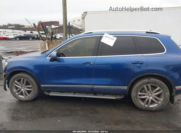 WVGEF9BP9GD003397 2016 VOLKSWAGEN TOUAREG Blue Widok wnętrza z tyłu