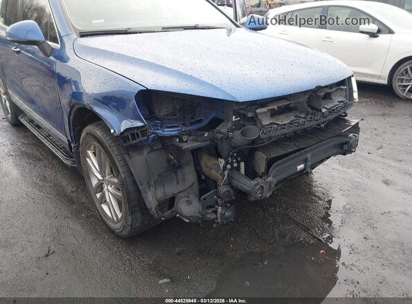 WVGEF9BP9GD003397 2016 VOLKSWAGEN TOUAREG Blue Widok z przodu