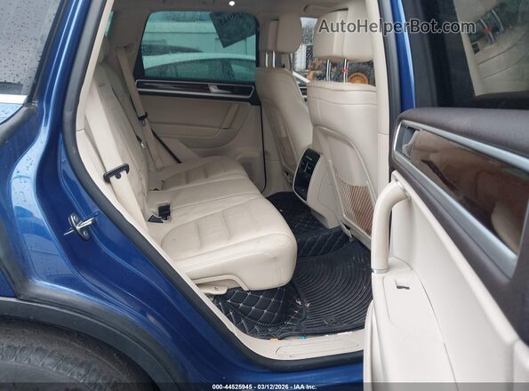 WVGEF9BP9GD003397 2016 VOLKSWAGEN TOUAREG Blue Widok naklejki z numerem VIN