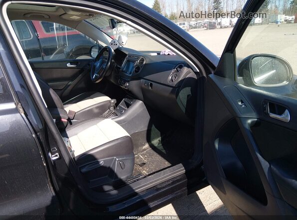 WVGSV7AX2HW505024 2017 VOLKSWAGEN TIGUAN Black წინა სალონის ხედი