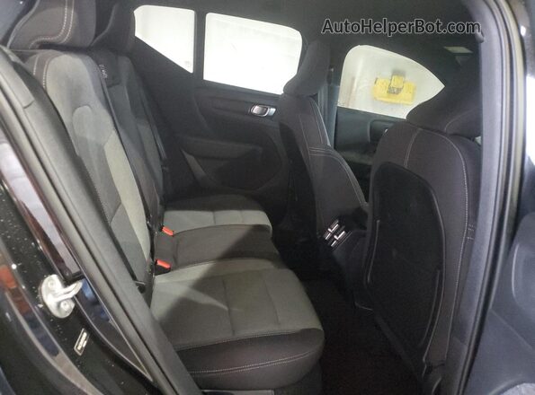 YV4L12UK0P2029088 2023 VOLVO XC40 Black Vista interior trasera