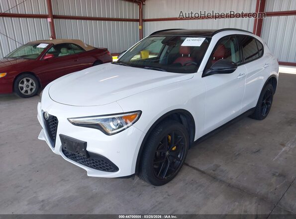 ZASPAKAN6K7C70000 2019 ALFA ROMEO STELVIO White წინა მარცხენა ხედი სამი მეოთხედიდან