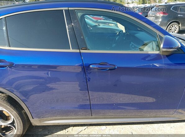 ZASPAKBN7N7D26982 2022 ALFA ROMEO STELVIO Blue 360 interior view