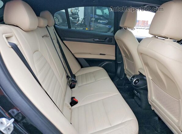 ZASPAKBN9P7D64216 2023 ALFA ROMEO STELVIO Black Vista interior trasera