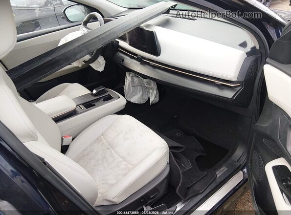 jn1df0bbxrm736872 2024 NISSAN OTHER Blue წინა სალონის ხედი