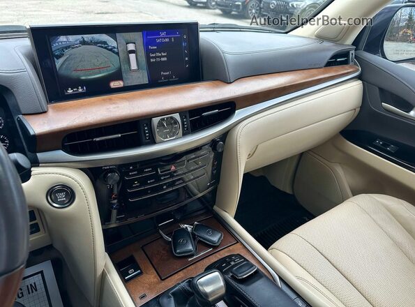JTJHY7AX2K4285356 2019 LEXUS LX White Rear interior view
