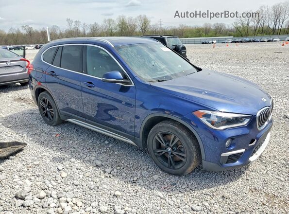 WBXHT3C36G5F63784 2016 BMW X1 Blue Вид спереду