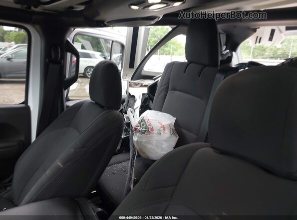 1C4HJXDN2PW674754 2023 JEEP WRANGLER White Vista de la etiqueta del VIN