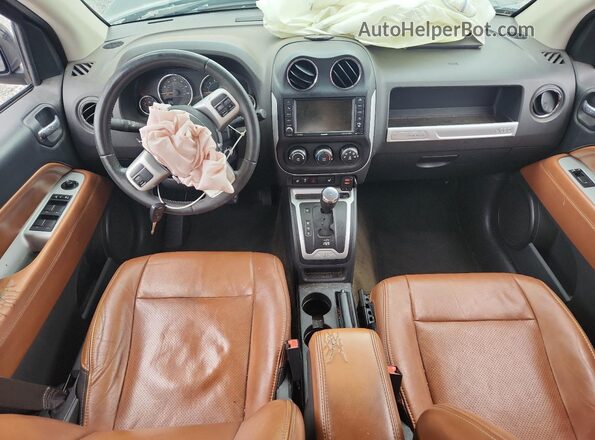 1C4NJCEA4GD747948 2016 JEEP COMPASS Black Dashboard view