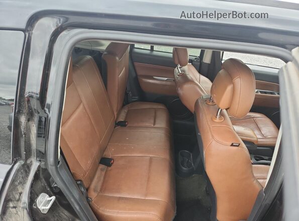 1C4NJCEA4GD747948 2016 JEEP COMPASS Black Rear interior view