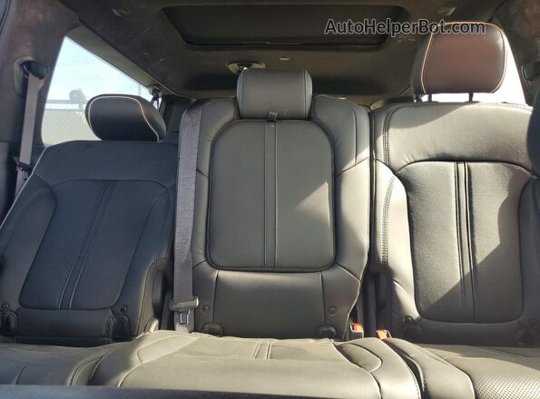 1C4SJSFP7RS103472 2024 JEEP GRAND Black Rear seats view