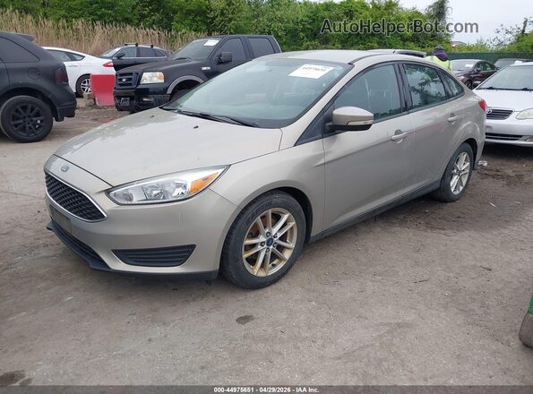 1FADP3F29GL242341 2016 FORD FOCUS Gold Vista tres cuartos delantera izquierda