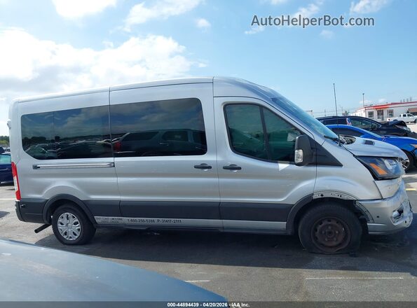 1FBAX2C87RKA83476 2024 FORD PASSENGER Silver Սալոնի հետևի տեսք