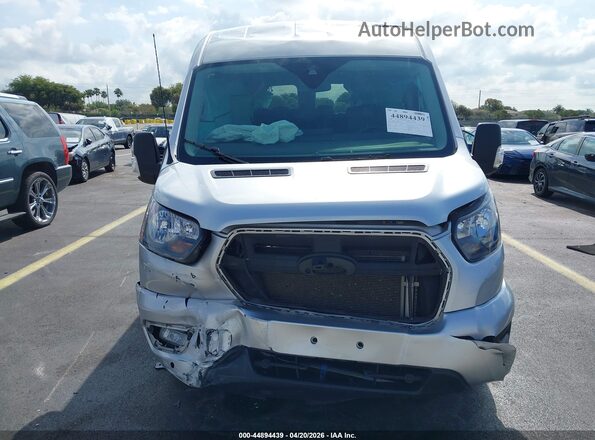 1FBAX2C87RKA83476 2024 FORD PASSENGER Silver Սարքավորումների վահանակի տեսք
