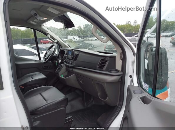 1FBAX2Y85RKA99703 2024 FORD PASSENGER White Front interior view
