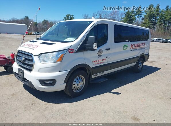 1FBAX9Y85LKA02435 2020 FORD PASSENGER White Front left