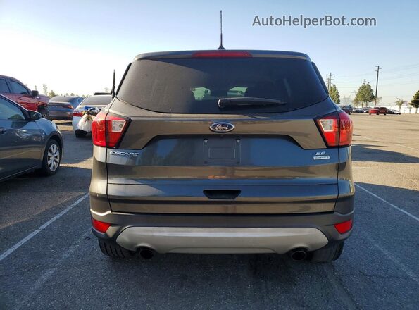 1FMCU0GD5KUB79329 2019 FORD ESCAPE Gray Widok z tyłu