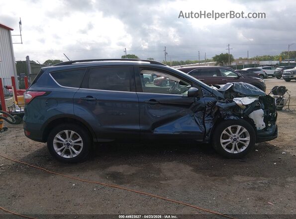 1FMCU9HDXJUB21055 2018 FORD ESCAPE Blue უკანა სალონის ხედი